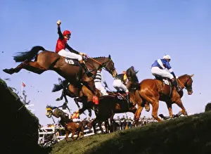 Horses clearing Bechers Brook, Grand National 1983