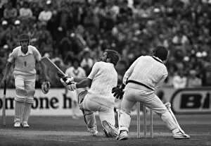 Images Dated 25th July 2011: Ian Botham sweeps on the way to 118 at Old Trafford during the 1981 Ashes