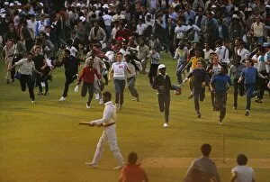 Images Dated 13th January 2011: India fans invade the pitch after their side wins the 1983 Cricket World Cup Final