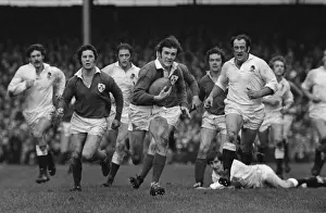 Irelands John Moloney makes a break against England - 1974 Five Nations