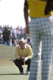 Images Dated 13th May 2009: Jack Nicklaus lines up a putt during the final round of the 1977 Open Championship