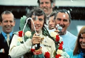 Images Dated 6th July 2011: Jackie Stewart celebrates winning the 1969 British Grand Prix