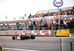 James Hunt crosses the line to win the 1976 British Grand Prix
