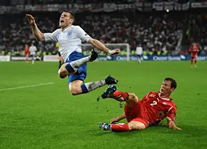 James Milner if fouled by Switzerlands Stephan Lichtsteiner