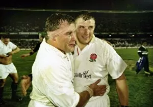 Images Dated 1st June 2012: Jason Robinson and Julian White celebrate after England defeated South Africa in 2000
