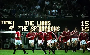 Jeremy Guscott celebrates scoring the series-winning drop-goal for the British Lions in 1997