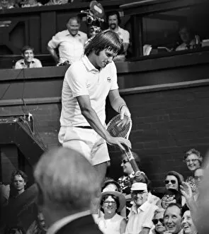 Images Dated 23rd April 2010: Jimmy Connors jokes with the Wimbledon crowd in 1975