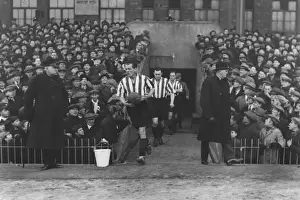 Jock McDougall leads out his Sunderland team at Villa Park in 1932 / 3