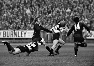 Images Dated 7th February 2013: John Dawes puts in a flying tackle on Bruce Robertson during the famous 1973 Barbarians-All Blacks