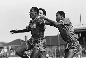 John Fashanu celebrates with Carlton Fairweather and Mark Morris