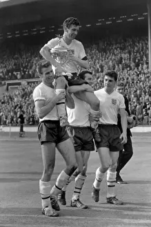 Johnny Haynes is carried by his teammates after England beat Scotland 9-3 at Wembley in 1961