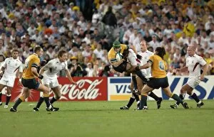 2003 Rugby World Cup Final Collection: Jonny Wilkinson puts in a huge tackle during the 2003 World Cup Final