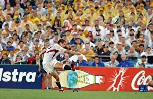 Images Dated 22nd November 2003: Jonny Wilkinson strikes a kick at goal in the 2003 World Cup Final