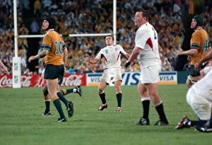 Images Dated 22nd November 2003: Jonny Wilkinson watches his drop-goal head towards the posts in the 2003 World Cup Final