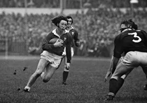 Rugby Collection: JPR Williams in full flight in 1976