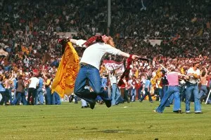 Images Dated 4th June 1977: A jubliant Scotland fan during the Wembley pitch invasion - 1977 British Home Championship