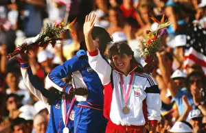 Kathy Cook waves to the crowd on the podium at the 1984 Los Angeles Olympics
