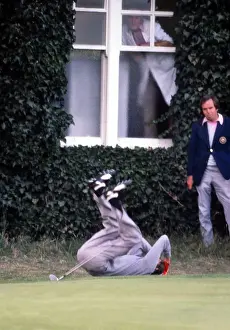 Ken Brown falls to the ground after his missed putt loses him a match at the 1977 Ryder Cup
