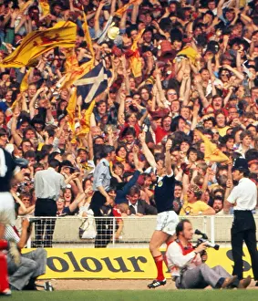 Kenny Dalglish celebrates his goal in front of the Scotland fans at Wembley - 1977 British Home Championship
