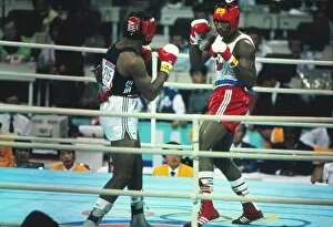 Images Dated 10th January 2012: Lennox Lewis takes on Riddick Bowe - 1988 Seoul Olympics - Boxing