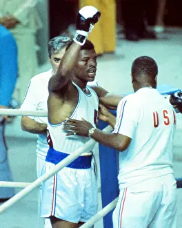 Leon Spinks celebrates his gold medal at the 1976 Montreal Olympics