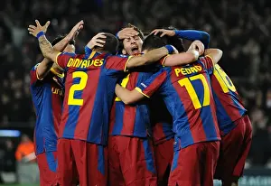 Lionel Messi celebrates with his Barcelona teammates after scoring his brilliant goal against Arsenal in the 2011 Champions League