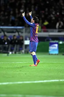 Lionel Messi celebrates scoring in the 2011 Club World Cup Final