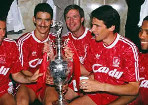Liverpools Ian Rush, Ronnie Whelan and Alan Hansen celebrate winning the league in 1990