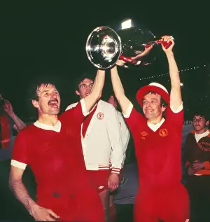 Liverpools Phil Neal and Ian Callaghan celebrate victory in the 1977 European Cup Final