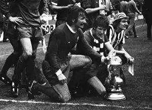 Liverpools Tommy Smith, Emlyn Hughes and Phil Thompson celebrate victory - 1974 FA Cup Final