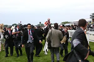 Luke Nolan and Black Caviar are surrounded by photographers at Royal Ascot