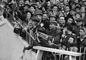 Images Dated 2008 December: Manchester United fans cheer their team onto the field before the 1958 FA Cup semi-final