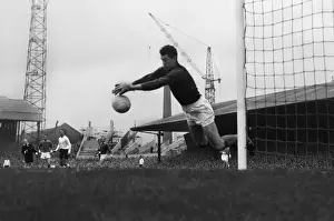 Manchester United goalkeeper Patrick Dunne makes a save at Old Trafford