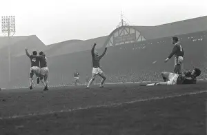 Portfolio Prints: Manchester United players celebrate Paddy Crerands goal at Anfield in 1964