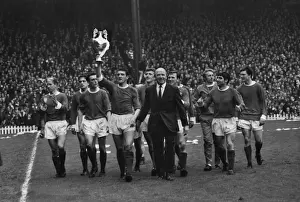 The Manchester United team do a lap of honour with manager Matt Busby after winning the league title in 1967