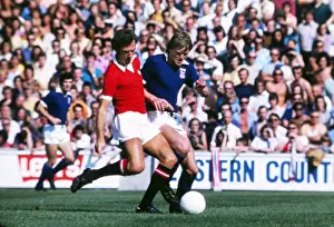 Manchester Uniteds David Sadler and Ipswich Towns Trevor Whymark