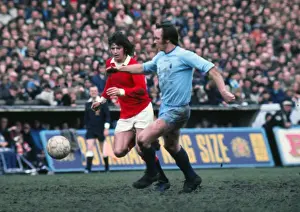 Manchester Uniteds Willie Morgan and Coventrys Roy Barry