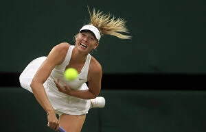 Images Dated 28th June 2011: Maria Sharapova in action during the 2011 Wimbledon Championships