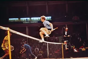 Mark Cox vaults the net after winning the 1975 Rothmans International Tennis Trophy