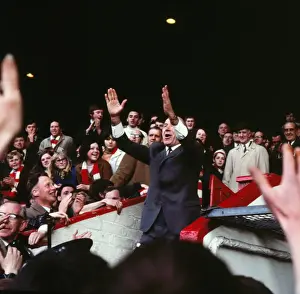 Matt Busby says farewell to the Old Trafford fans after his last home game as Manchester United manager