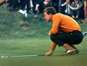 1969 Ryder Cup Collection: Maurice Bembridge lines up a putt during the 1969 Ryder Cup