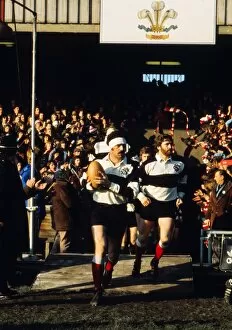 Images Dated 28th February 2012: Mervyn Davies and Ray Gravell run out for the Barbarians at Cardiff in 1976