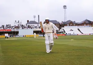 Michael Atherton walks back to the pavillion after scoring his maiden Test century