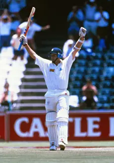 Mike Atherton celebrates reaching his century on the way to scoring 185 not out against South Africa in 1995