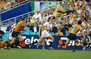 Images Dated 22nd November 2003: Mike Tindall on the ball during the 2003 World Cup Final