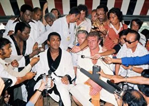 Images Dated 7th February 2012: Muhammad Ali and Joe Bugner at the press conference after their second fight, in 1975