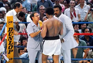 Muhammad Ali receives some last words of advice from his corner before taking on Joe Bugner in 1975