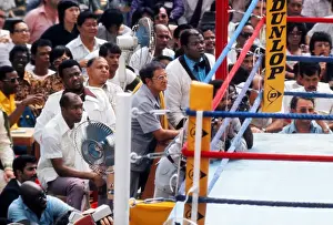 Boxing Prints: Muhammad Alis team watch on from ringside as their man takes on Joe Bugner