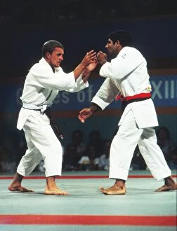 Images Dated 4th January 2011: Neil Eckersley takes on Eddy Koaz - 1984 Los Angeles Olympics