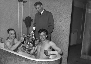 Newcastle Uniteds Ron Batty and Ronnie Simpson celebrate winning the 1955 FA Cup